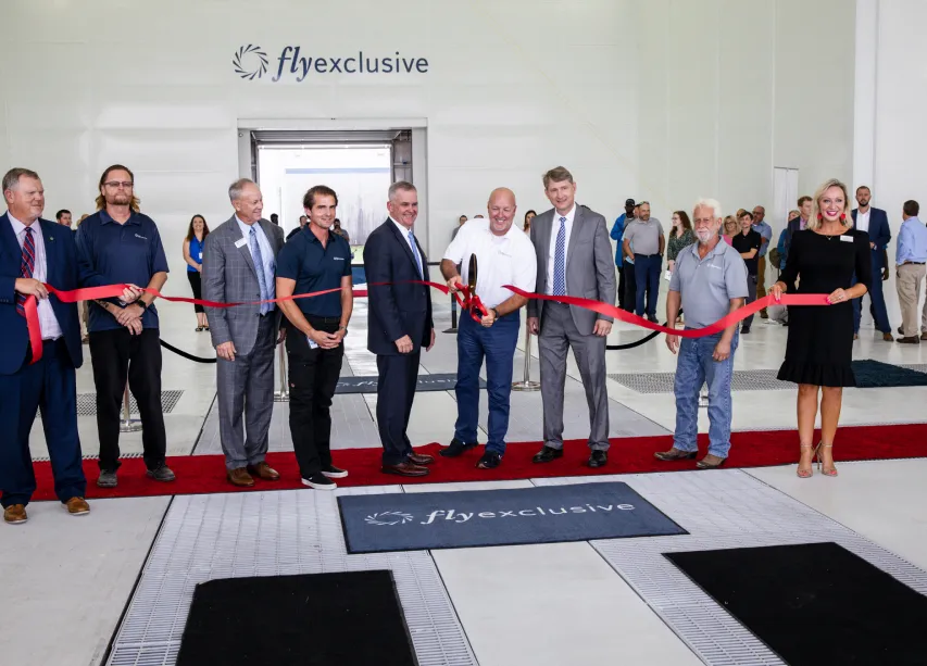 Large group photograph of the flyExclusive leadership team