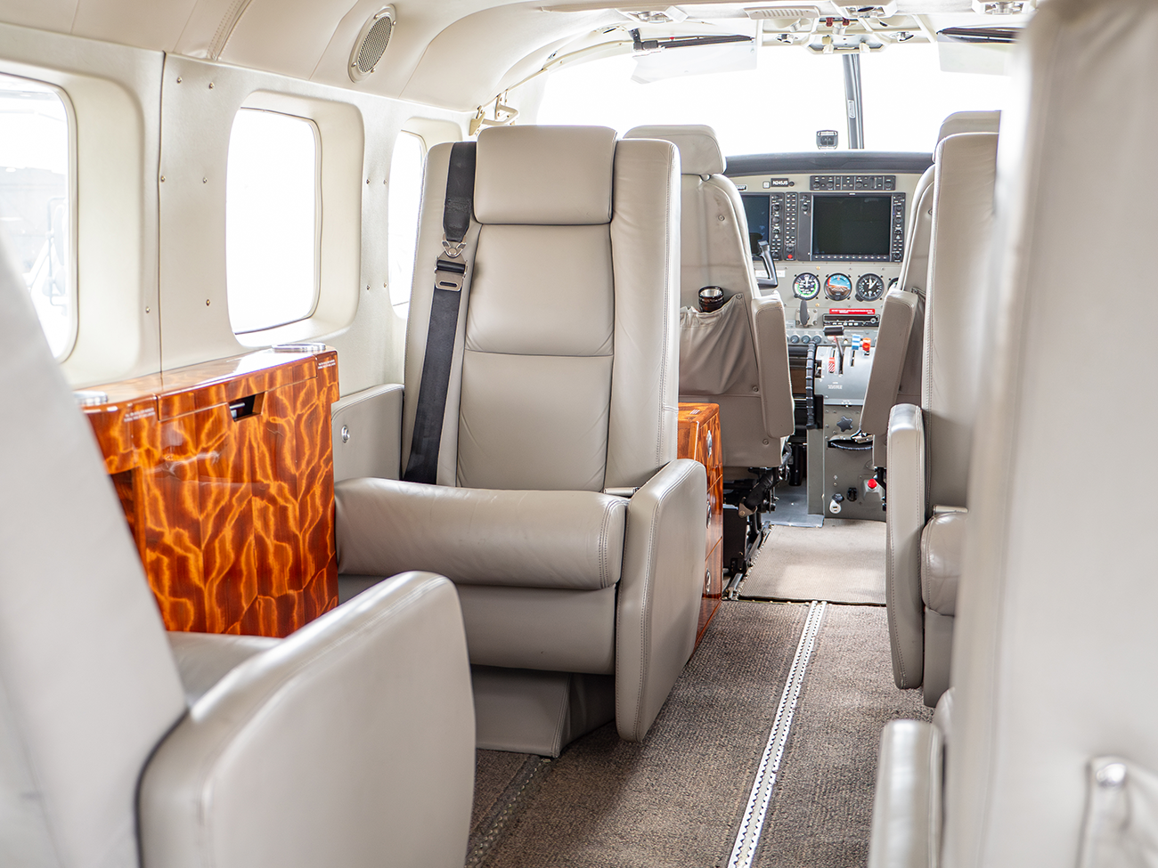 Refurbished seating and a burl side panel, looking forward